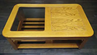 Wooden coffee table with glass inset, View more