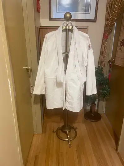 ** Gi heavy white cotton, as new, Toraki size med., Fuji with pants, size 2, $75. ea.** Wear Well br...
