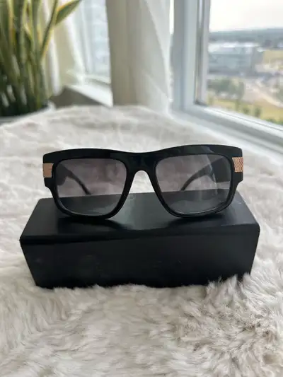 Stylish Givenchy sunglasses with gold accents