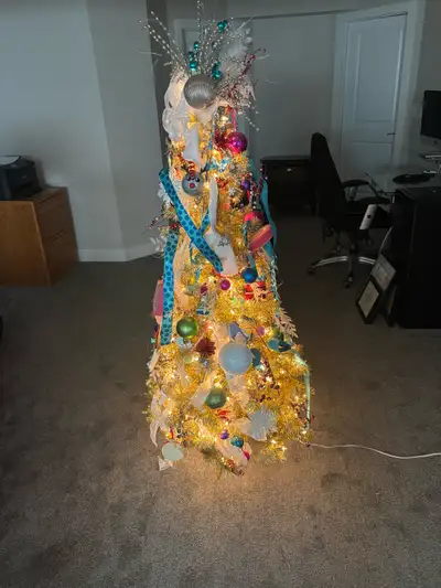 Christmas tree with permanent decorations , View more