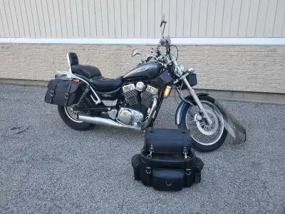 Hey I have a 2003 Suzuki Intruder 1400cc with removable windshield and back bag looking to sell or t...
