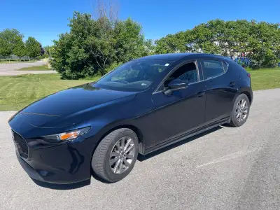 2022 Mazda 3 awd 2.5L Skyactiv-G leather interior 115km automatic transmission Blue exterior, black...