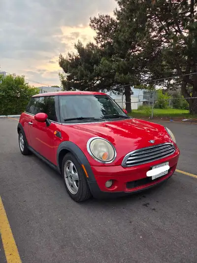 2010 Red Mini cooper , low kilometers Heated front seats Selling as is