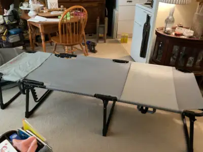 Outbound brand camp cot, purchased from Canadian Tire, June 2024. 77” long, 28” wide, 18” high, grey...