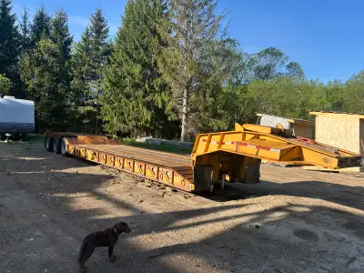 1987 Eager Beaver lowboy , tires and suspension all in great shape . Good solid trailer heavy duty ....