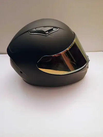 XL Full Size motorcycle helmet with a tinted visor.Has a few nicks but overall it's in good conditio...