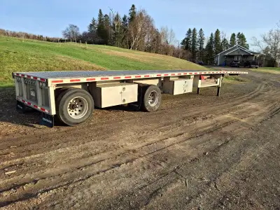 2018 Fontaine 48ft fully aluminum flatbed. 10ft spread with a air lift front axle. Rubber still has...
