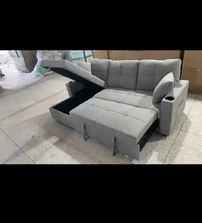 This brand new pull-out sectional sofa bed is the perfect addition to any living space, offering bot...