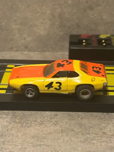73’ AFX PLYMOUTH #43 ROAD RUNNER STOCKER ORANGE/ YELLOW SLOT CAR, View more