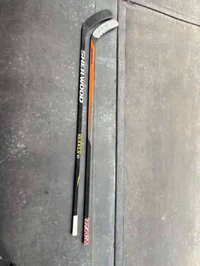 hockey sticks, left hand and full right goalie, View more
