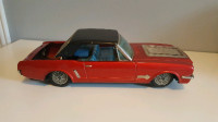 1960s Yonezawa Mustang Battery Operated Tin Car