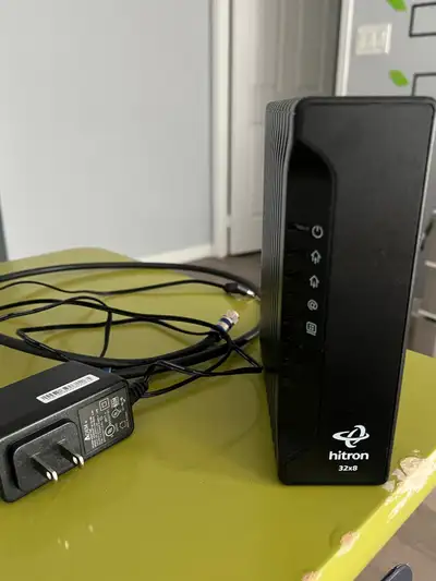 Modem with power cord and Ethernet For Roger’s , Shaw &Teksavvy internet