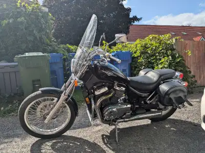 I am selling two motorcycles. One is a black Suzuki S50 Boulevard 2009ish and the other one is two-t...