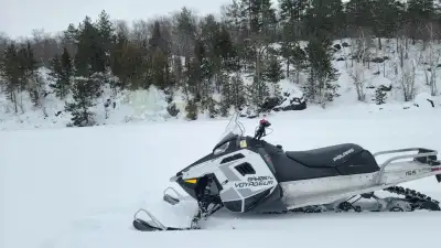 2020 Polaris Voyageur 550 Fan 155. Comes with two up seat and rear rack. Trailering cover, sleigh wi...