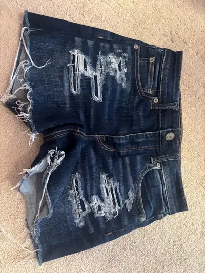 Size 2. Only worn a couple times.