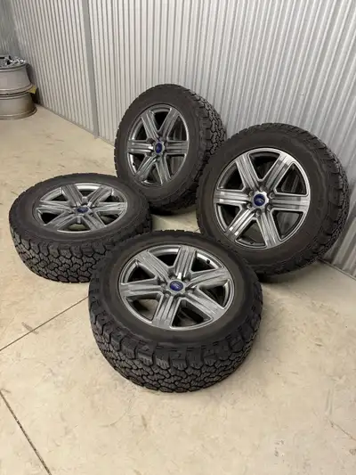 20” F150 Lariat 6x135 bolt pattern rims with OEM Ford TPMS + LT275/60R20 (33”) General Grabber A/Tx...