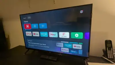 32 inch TCL qled tv like new, View more
