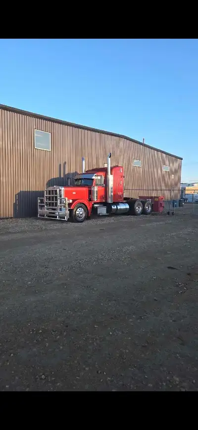 2012 Peterbilt 389 550 hp ISX 18 speed 40 rears 3.70 gears 4 way locks 48" Bunk 2000 watt power inve...
