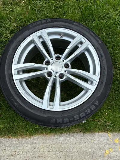 I'm selling a set of four used tires mounted on rims, size 245/45R18, that would be an excellent add...