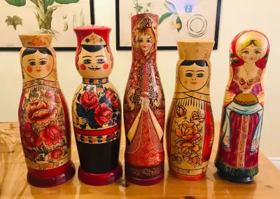 5 Matryoshka Folk Art Hand Painted Large Wooden Bottle holders. Measurements vary from 15” high down...
