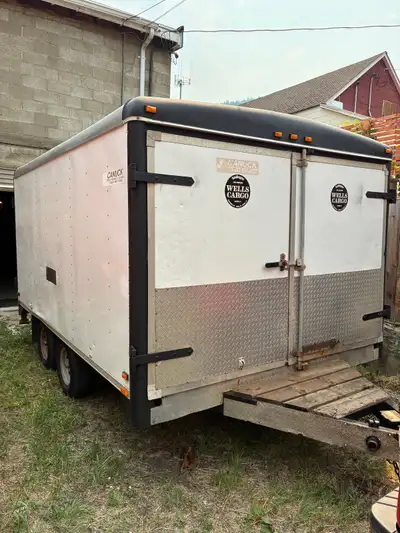 1996 Wells Cargo 8’x12’ tandem axle, well maintained in good used condition. New electric brakes, hu...