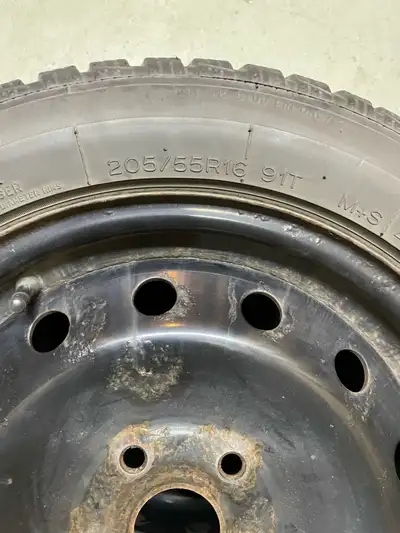 Up for sale is a single Uniroyal Ice & Snow 3 winter tire mounted on a steel rim, size 205/55R16 91T...