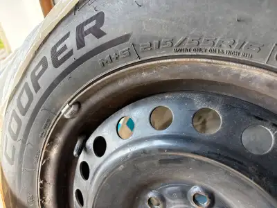These pre-owned Cooper 215/55R16 tires provide reliable all-season performance for your vehicle. The...