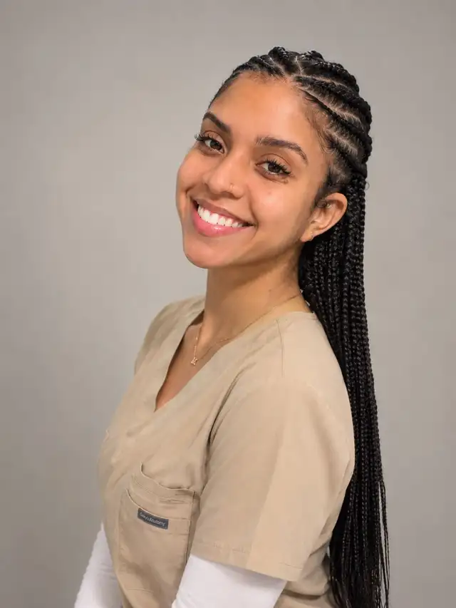 Massage therapist trainee