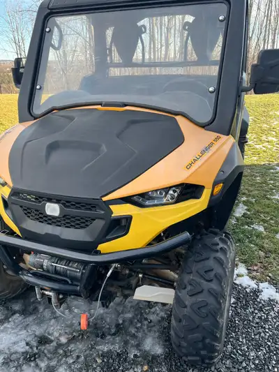 Comes with Cub Cadet plow and also a cover for the entire vehicle