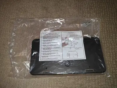 I am selling an OEM Toyota Corolla Front License Plate Bracket with Installation Procedures in new c...