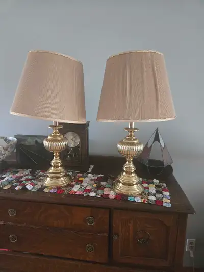 2 brass colored lamps, View more