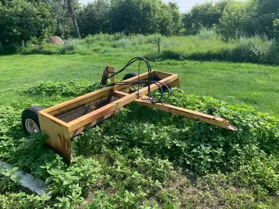 10 foot land leveler with decent tires that hold air and new hydraulic hoses. Works great for moving...