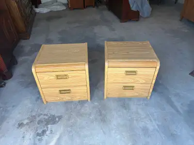 120$ 17 inch by 20 inch (21 inch high) A used pair of matching nightstands with a light oak wood gra...