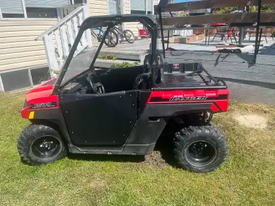 Youth Polaris ranger 150 in great shape. Fuel injected, newer battery and belt. Ranger has roof, ste...
