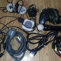 Assorted A/V Cords And Controllers for sale.