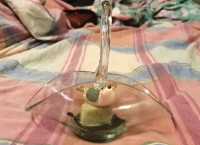 CLEAR GLASS BASKET WITH SMALL BIRD INSIDE