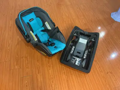Selling an Evenflo infant car seat with matching base in blue and black. Clean, well-maintained, and...