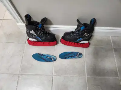 size 4R. includes Superfeet performance insoles and blade guards. excellent condition.