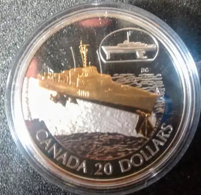 Silver coin with selective gold plating. Weighs 31 grams.