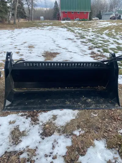 REDUCED ….. New72 inch , 4 in 1 combination bucket for skidsteer . No buyers fee or taxes