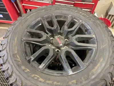 20” gmc takeoff wheels w/ BFG All Terrain T/A tires 285/60R20. Have 3,000 kms on them. Asking $1,500...