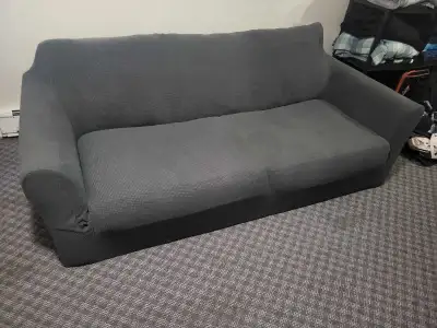 couch with grey couch cover