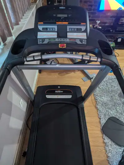 Tempo 632T treadmill in good working condition.The bottom deck folds up and has been barely used.