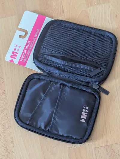 NEW passport wallet. Hold cards, boarding passes and other travel documents PICKUP SOUTH SIDE ON EDW...
