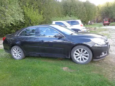 Like new. Economical 2 litre turbo, No rust, includes set of winter Michelins on OEM alloy rims, rus...