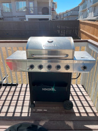 Propane Gas Grill in Stainless Steel with a free Patio Umbrella