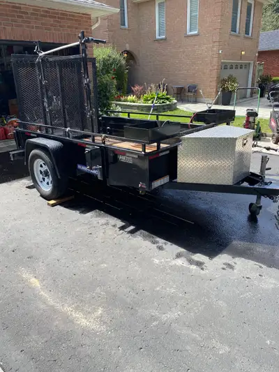 Suretrac 8x5 trailer Holds 4x10 litre gas cans 3 side rack for trimmers Storage box Serious inquires...