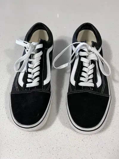 Women’s black and white Vans low cut shoe, View more