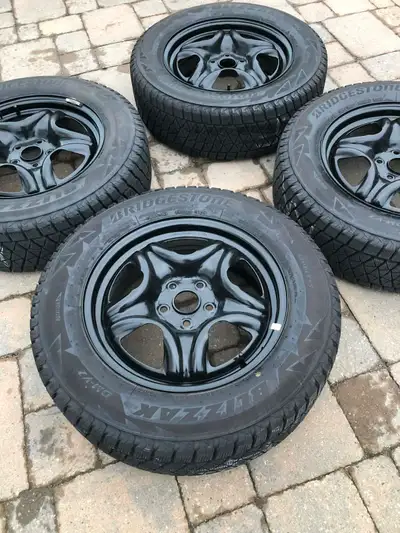 Toyota RAV4 fitment set of four 225/65R17 Bridgestone Blizzak DM-V2 winter tires with Toyota Factory...