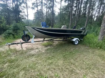 17 foot aluminum fishing boat with a 4 stroke 20 horse Mercury motor with electric start.